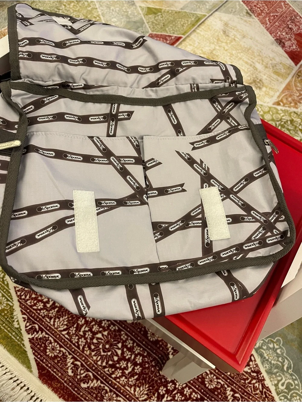 Lesportsac White and Brown Patterned Messenger Bag